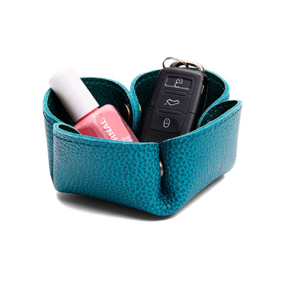 Sea Glass | Clover-shaped foldable leather tray with snap-button corners holding nail polish and car keys
