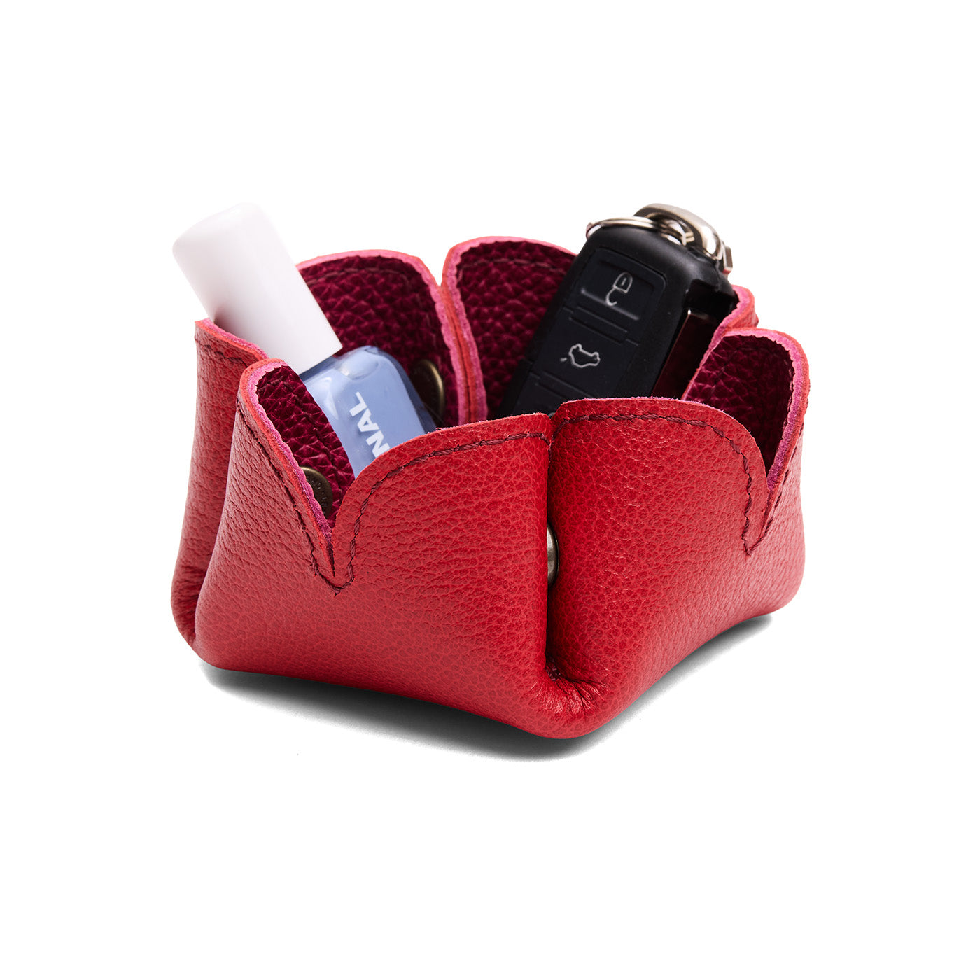 Cosmo | Desert bell-shaped foldable leather tray with snap-button corners holding items