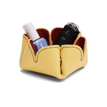 Koi | Desert bell-shaped foldable leather tray with snap-button corners holding items