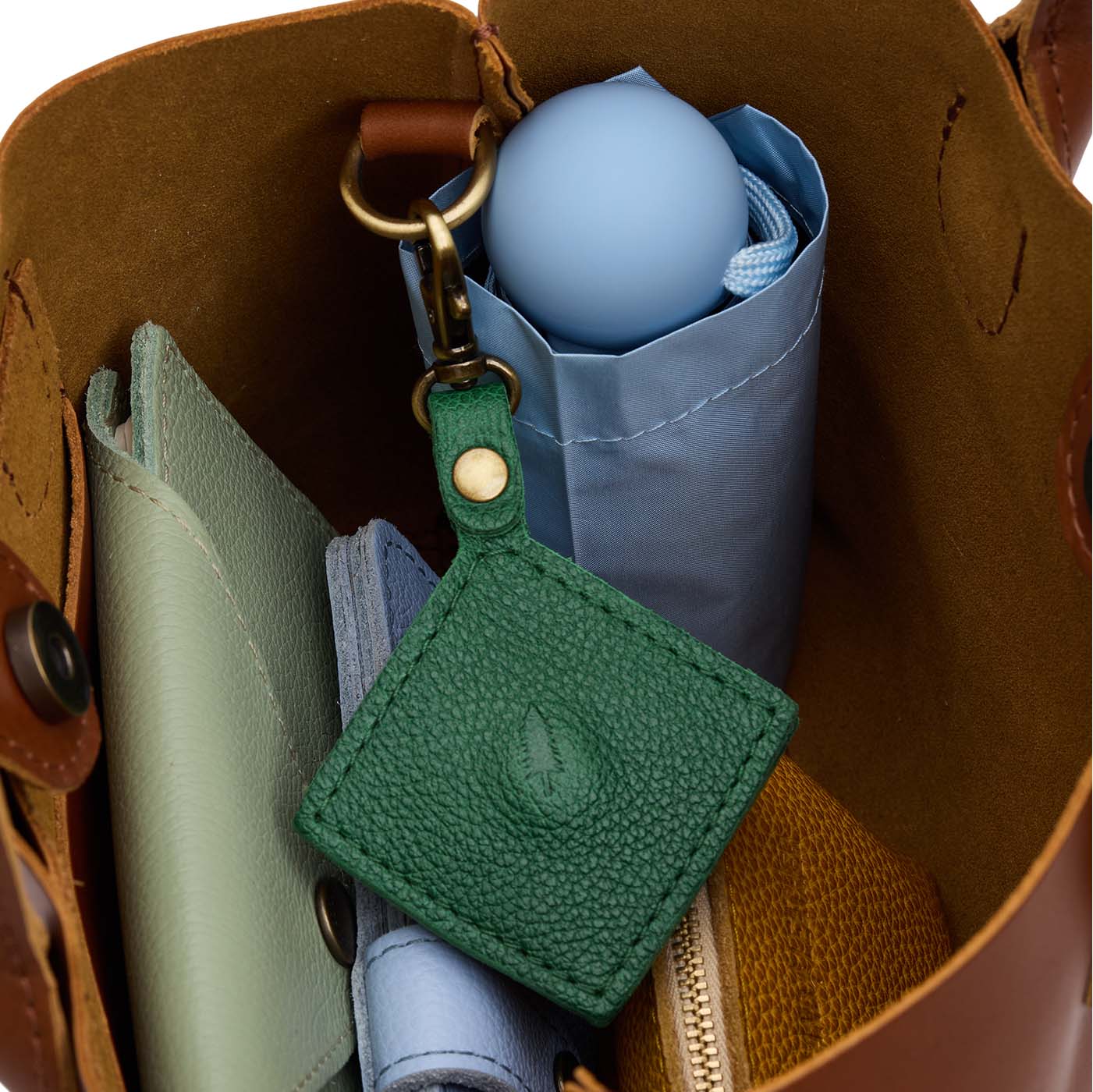 Bacalar| Diamond shaped leather AirTag holder on a lobster clasp keychain