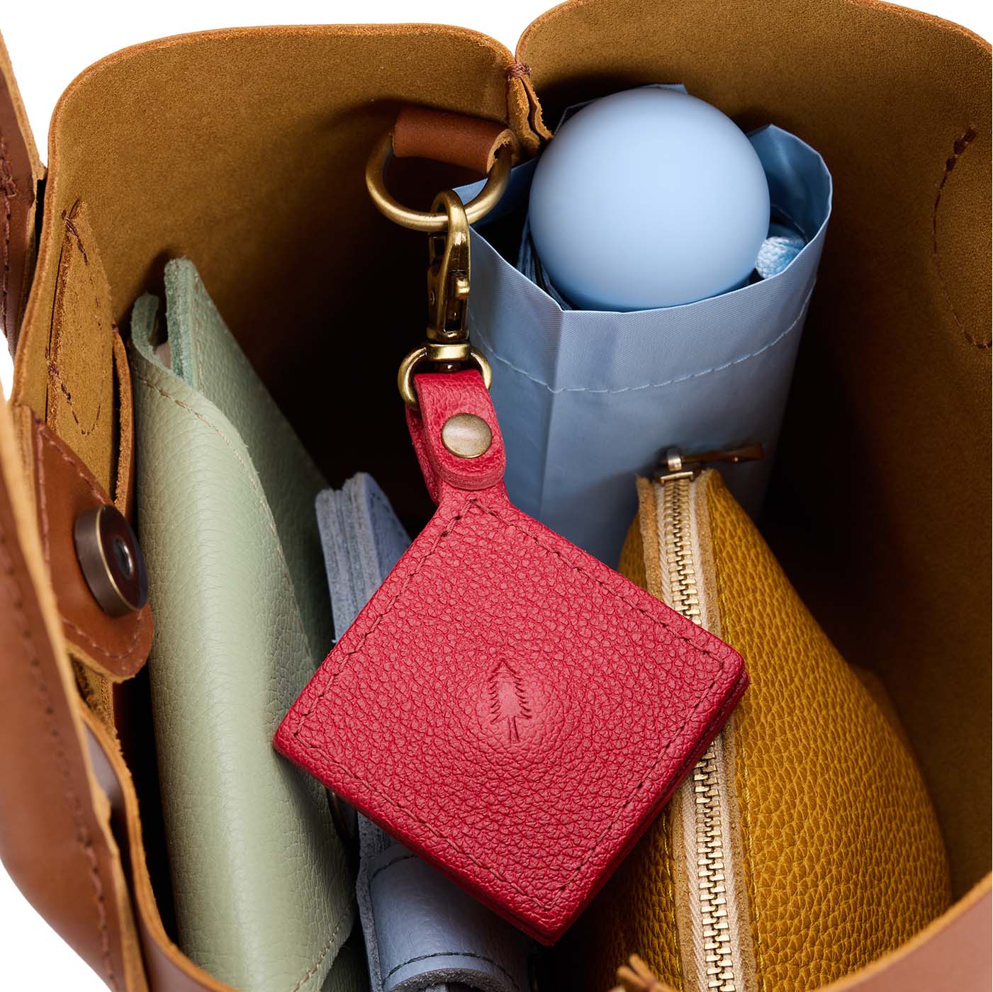 Cherry | Diamond shaped leather AirTag holder on a lobster clasp keychain