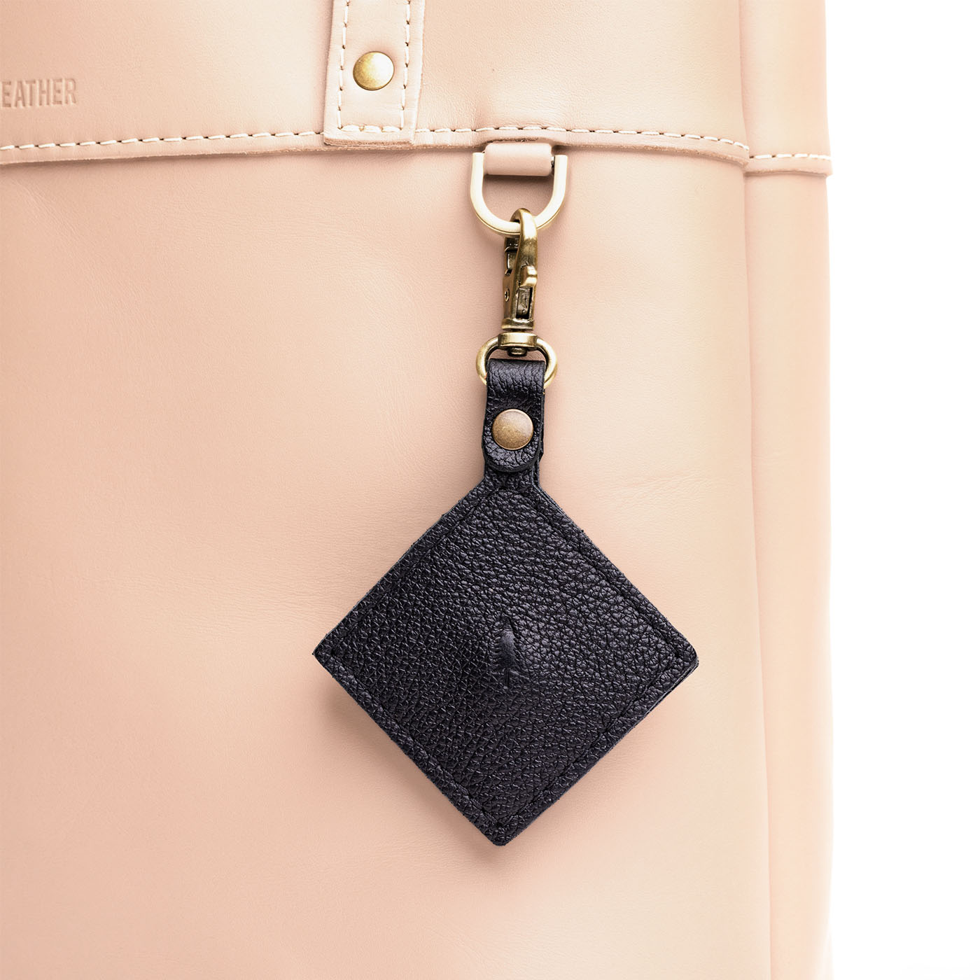 Pebbled--black | Diamond shaped leather AirTag holder on a lobster clasp keychain