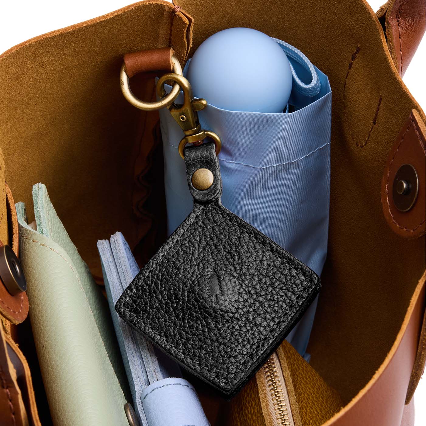 Pebbled--black | Diamond shaped leather AirTag holder on a lobster clasp keychain