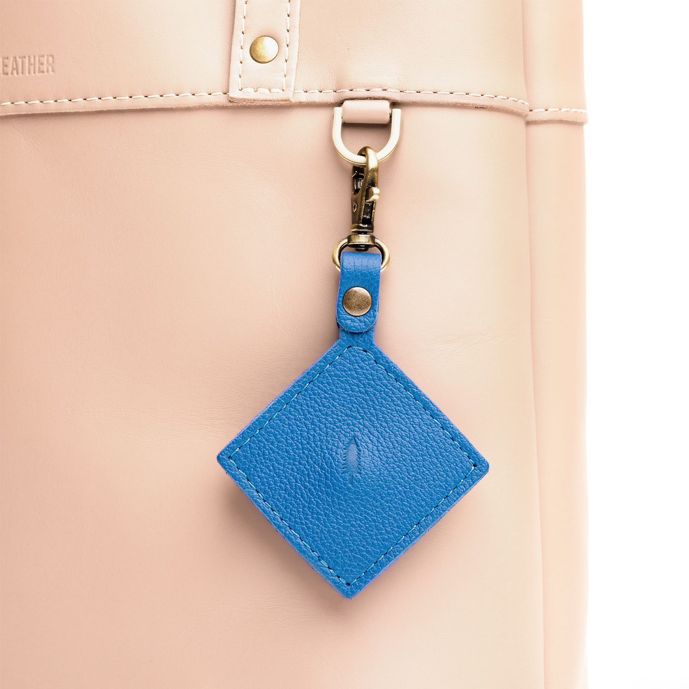 Skydive | Diamond shaped leather AirTag holder on a lobster clasp keychain
