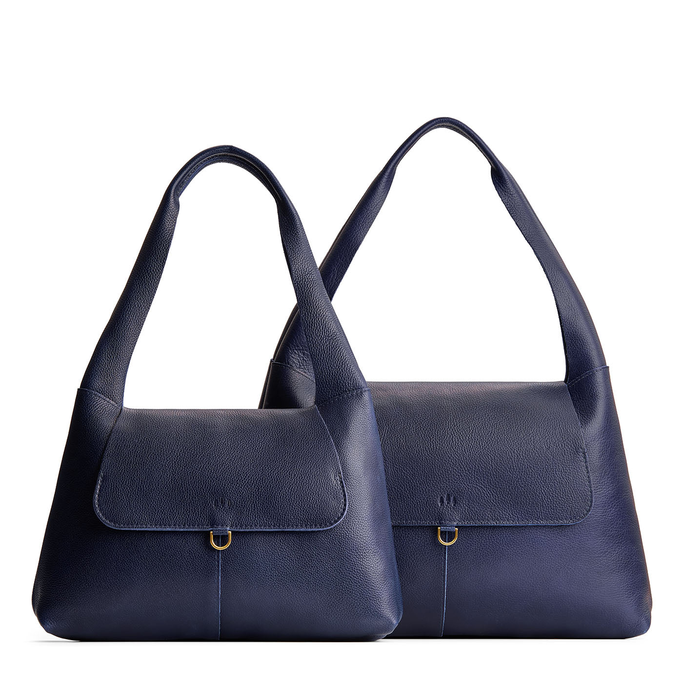 Cobalt | Comparison image of a slouchy triangle shaped shoulder bag with a flap