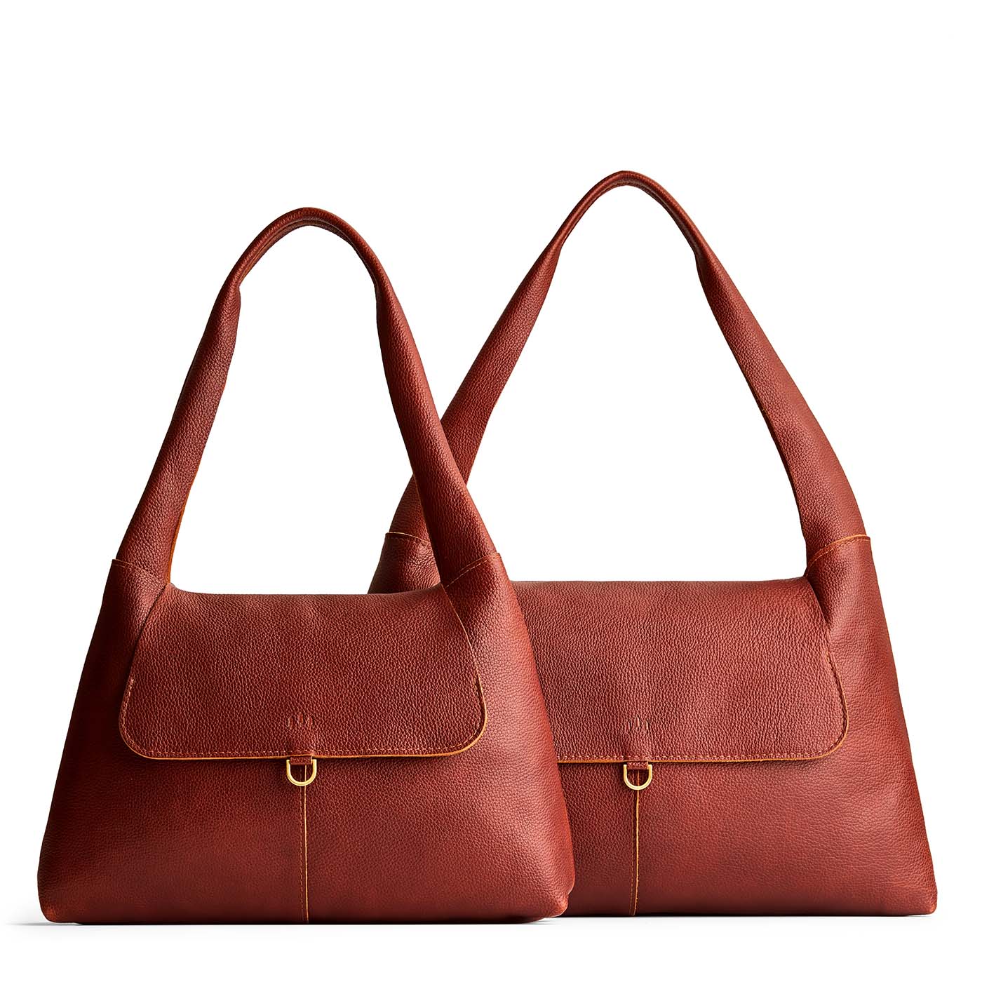 Nutmeg | Comparison image of a slouchy triangle shaped shoulder bag with a flap