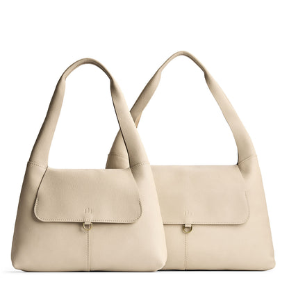Pebbled Bone | Comparison image of a slouchy triangle shaped shoulder bag with a flap