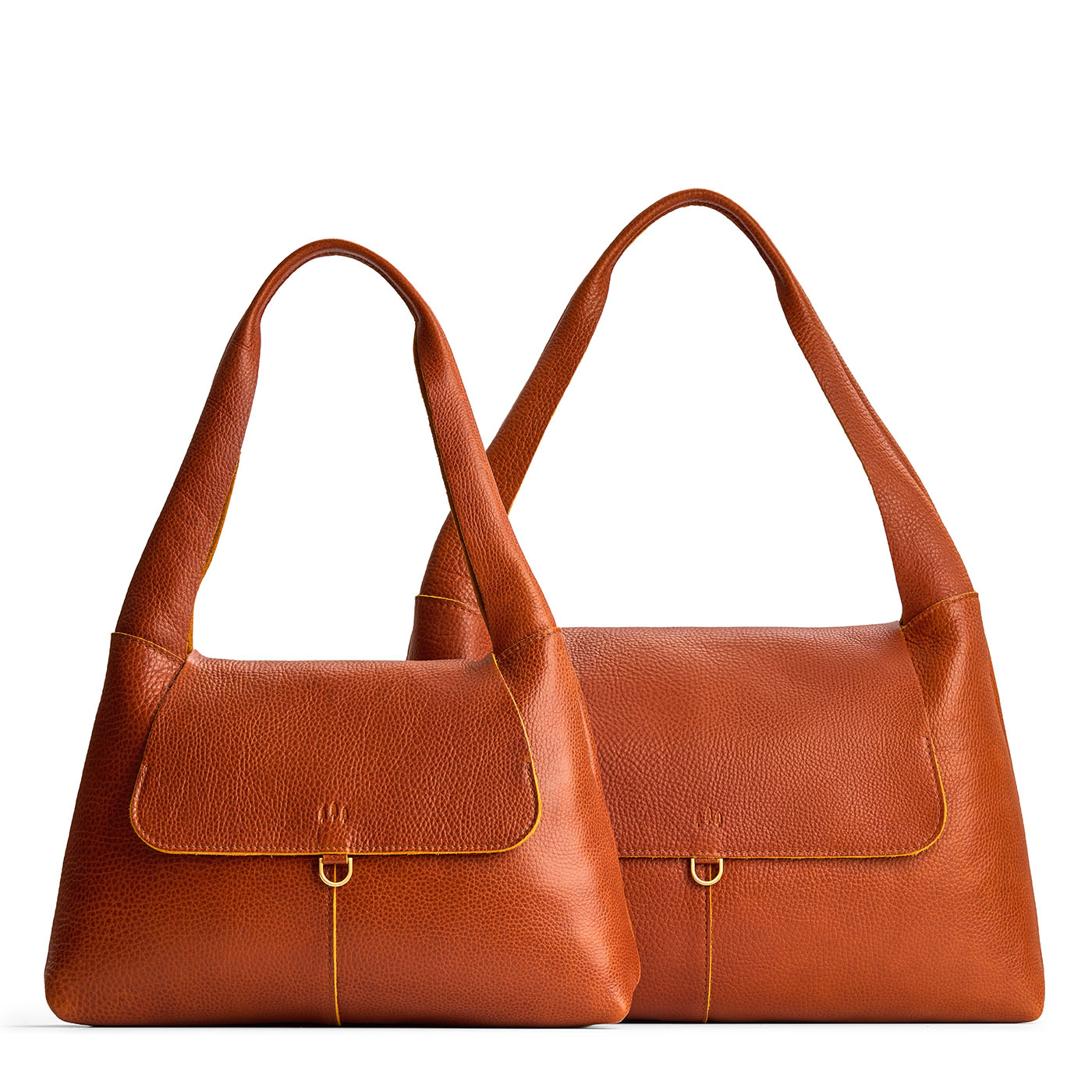 Sienna | Comparison image of a slouchy triangle shaped shoulder bag with a flap