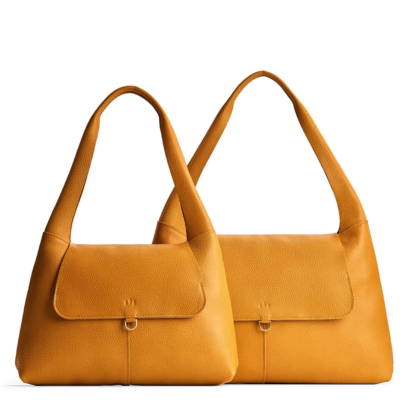 Sunshine | Comparison image of a slouchy triangle shaped shoulder bag with a flap