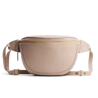 Oatmilk | Leather fanny pack shaped bag with a front zipper opening