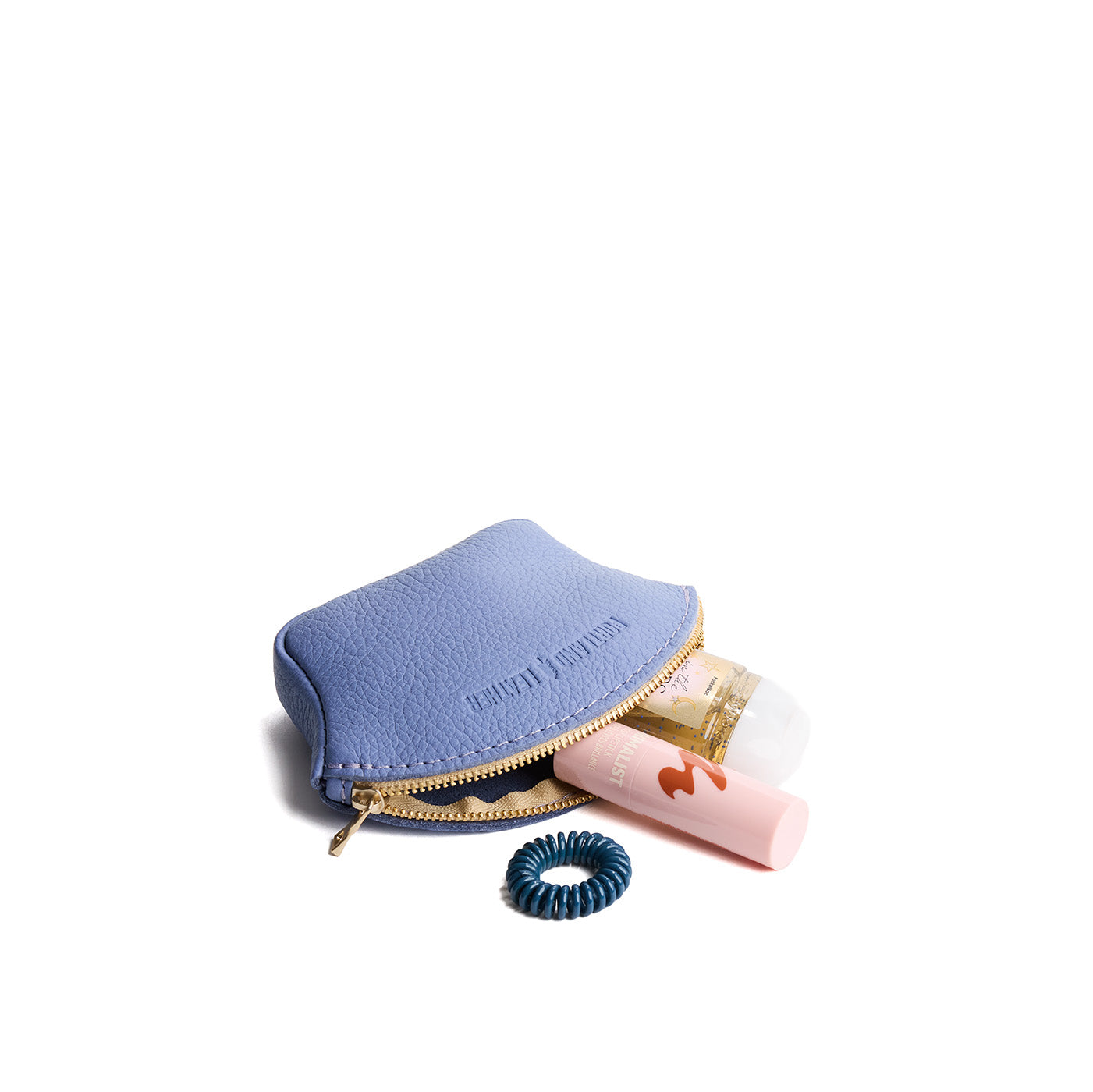 Aster*Small | Seashell shaped leather makeup bag with curved top zipper and flat bottom