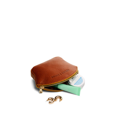 Sienna*Small | Seashell shaped leather makeup bag with curved top zipper and flat bottom