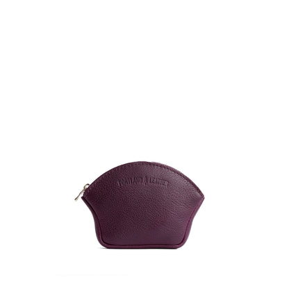 Plum*Small | Seashell shaped leather makeup bag with curved top zipper and flat bottom