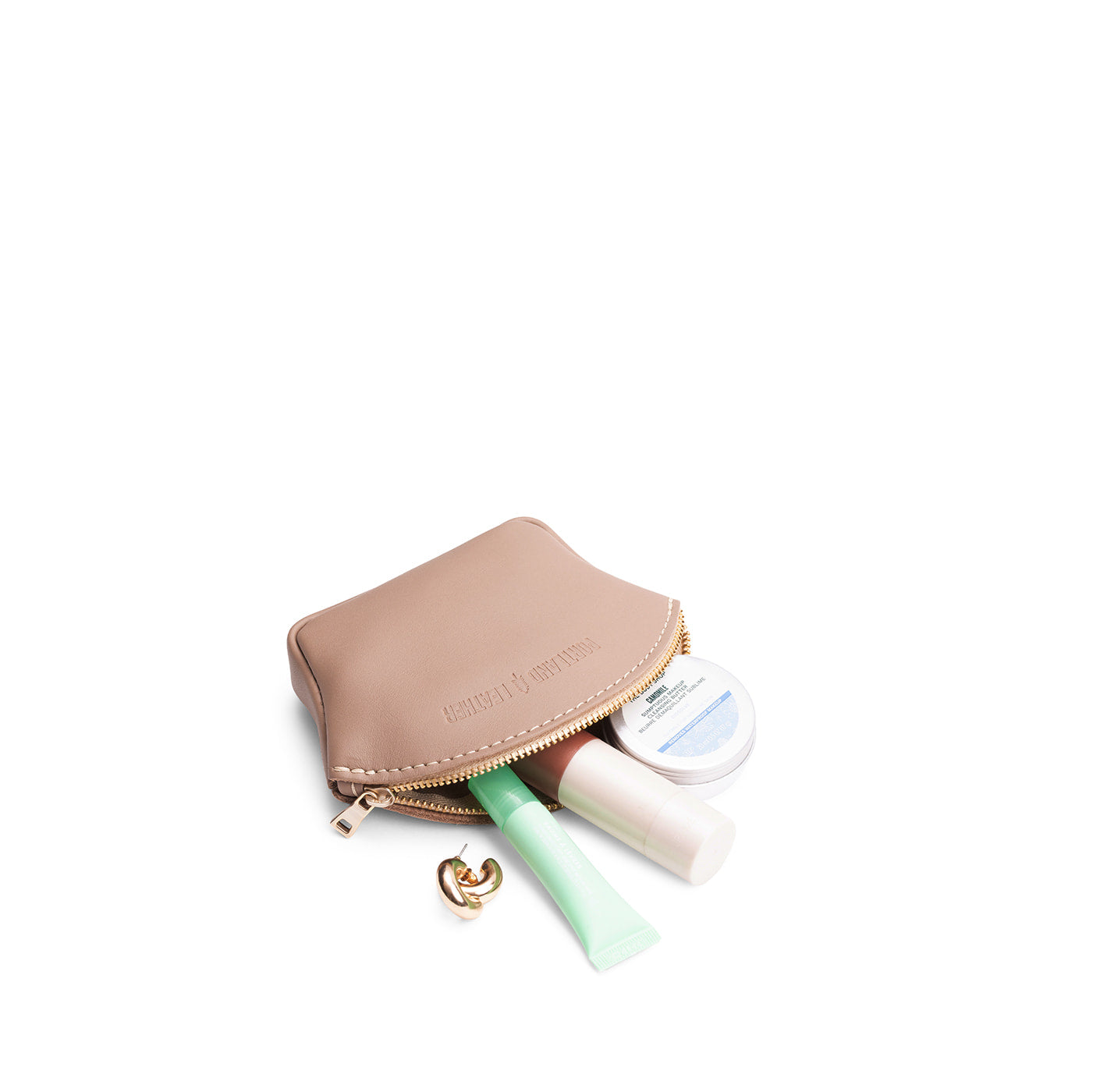 Stone*Small | Seashell shaped leather makeup bag with curved top zipper and flat bottom