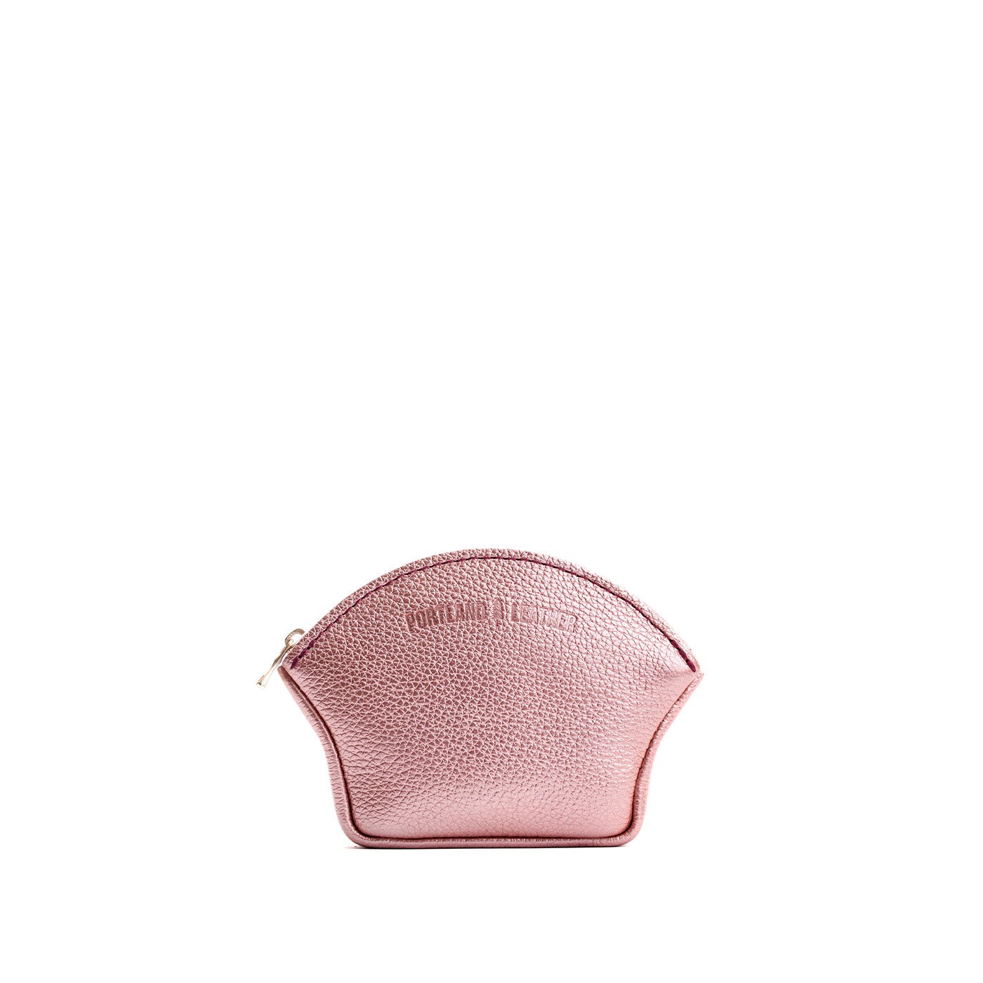 Supernova*Small | Seashell shaped leather makeup bag with curved top zipper and flat bottom