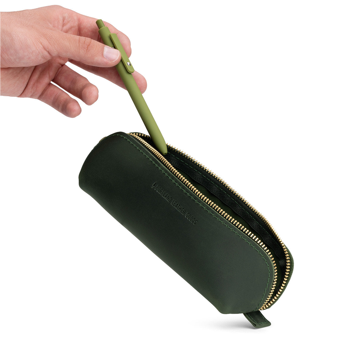 Evergreen | Leather pouch with curved seams and top zipper