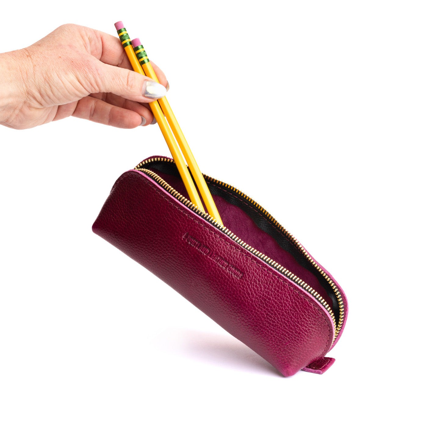 Orchid | Leather pouch with curved seams and top zipper