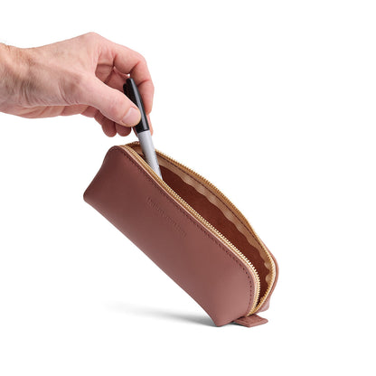 Sunkissed | Leather pouch with curved seams and top zipper