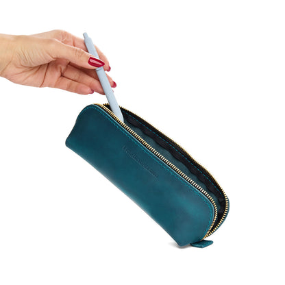 Westward Blue | Leather pouch with curved seams and top zipper