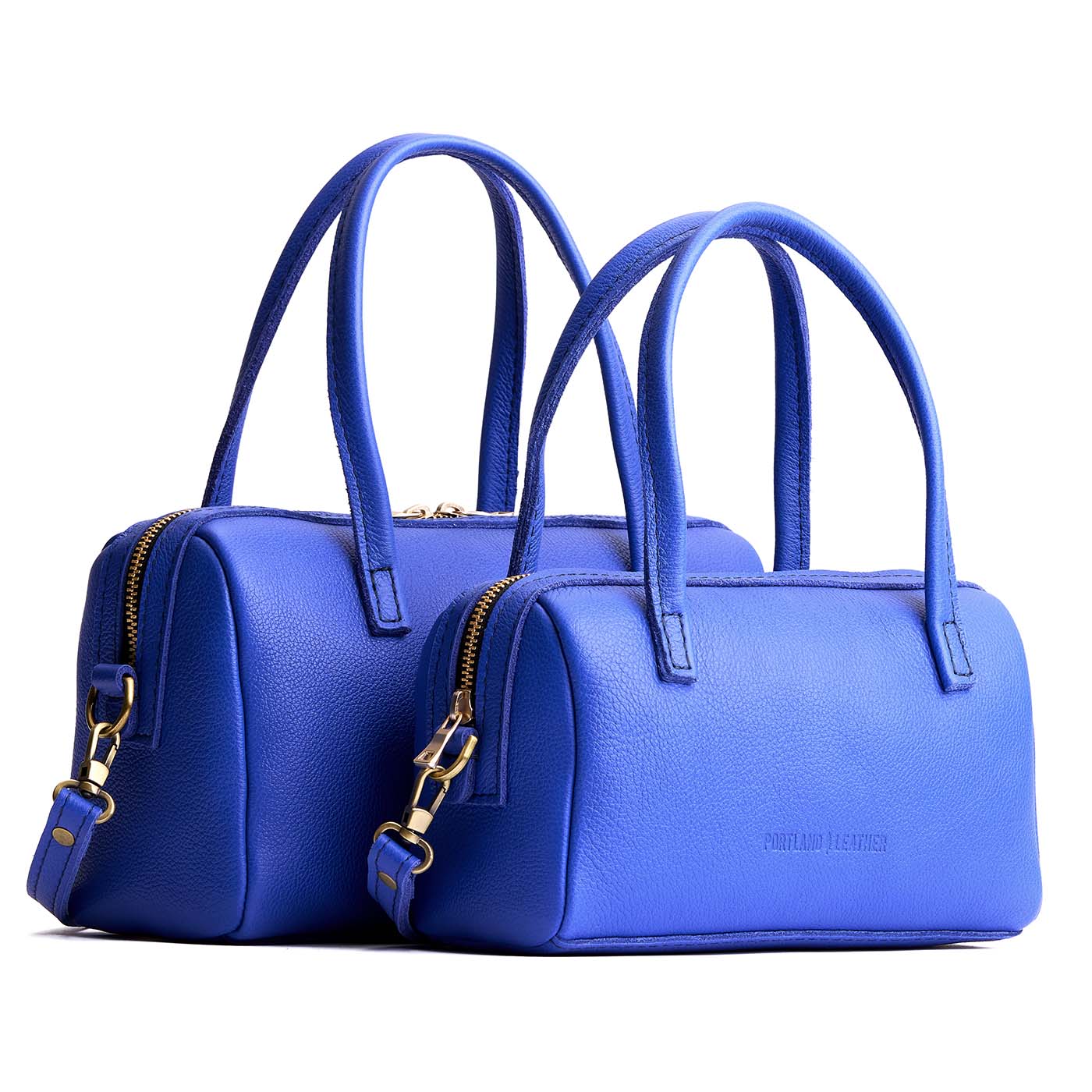 Astro Blue*Large | Two sizes of mini duffle shaped handbag with crossbody strap