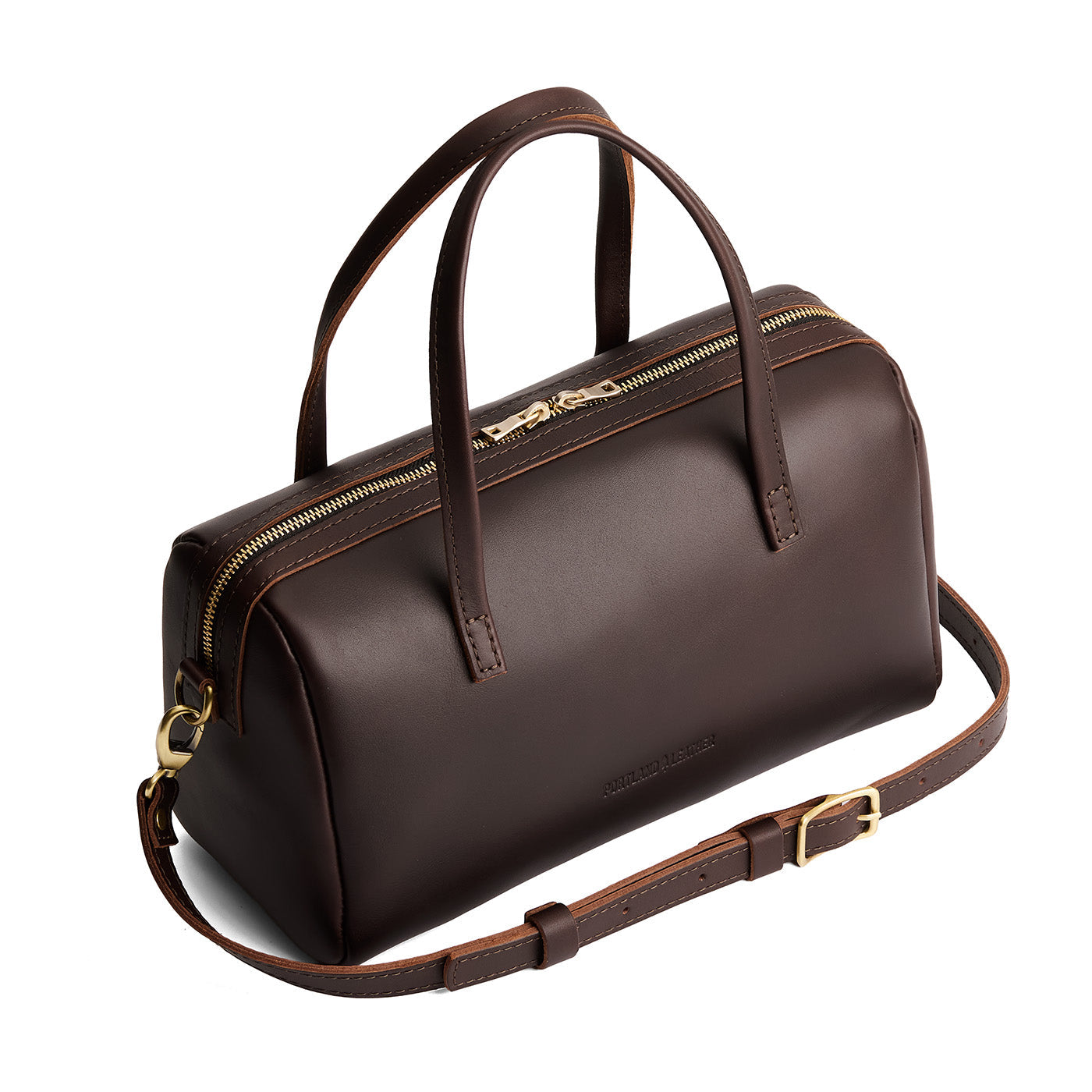 Grizzly*Oversized | Mini duffle shaped handbag with crossbody strap