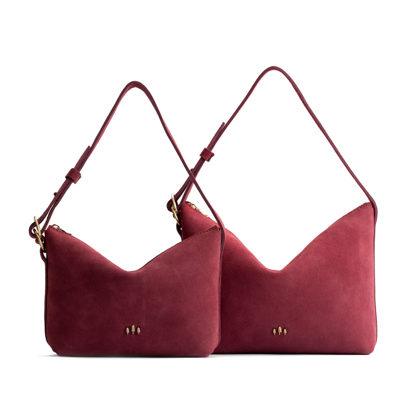 Red Panda | Size comparison shot of small and large slouchy leather shoulder bags with zipper opening and three metal tree emblems