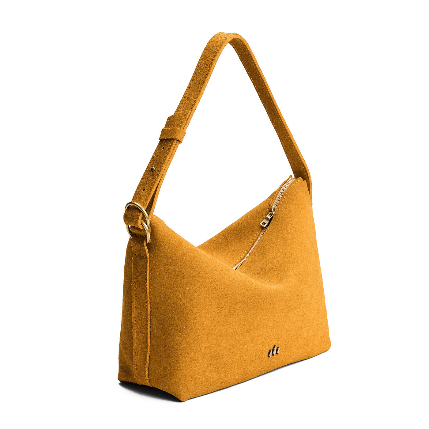 Dijon*Large | Slouchy Shoulder Bag that has a zipper opening and three metal tree emblems on a white background