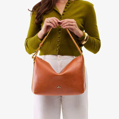 Sienna*Large | Medium sized slouchy leather shoulder bag with zipper opening and three metal tree emblems
