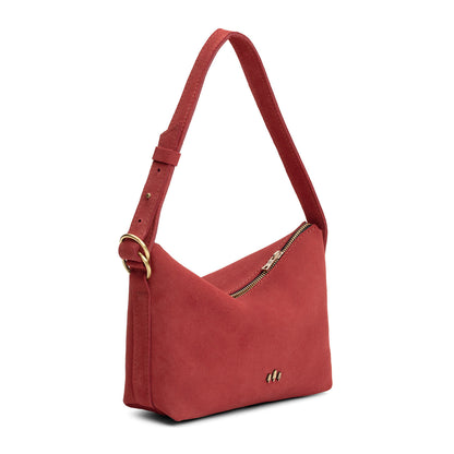 Cinnabar*Small | Slouchy Shoulder Bag that has a zipper opening and three metal tree emblems on a white background