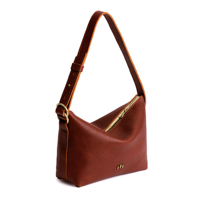 Nutmeg*Small | Petite slouchy leather shoulder bag with zipper opening and three metal tree emblems