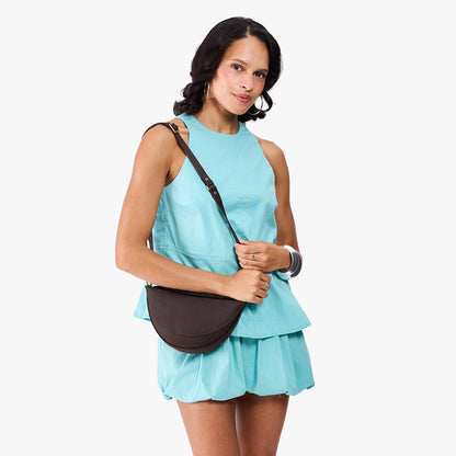 Moose*Small | Model wearing petite half circle shaped sling bag