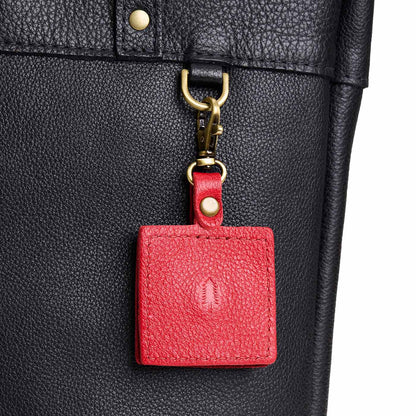 Cherry | Square-shaped leather AirTag holder with snap closure and swivel lobster claw clasp