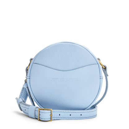 Skyway | Circle shaped crossbody bag with top zipper and gold accents