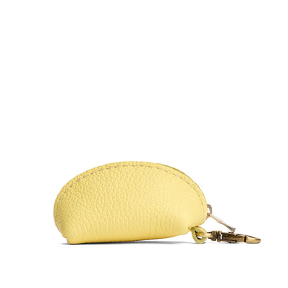 Butter Bliss | Taco shaped leather pouch with zipper and swivel lobster clasp on white background