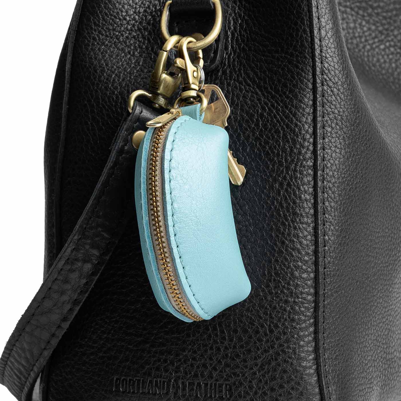 Cabo | Taco shaped leather pouch with zipper and swivel lobster clasp on bag