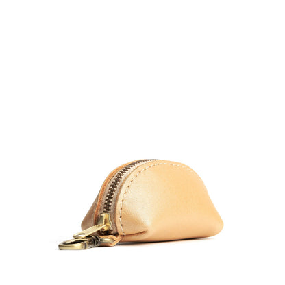 Champagne | Taco shaped leather pouch with zipper and swivel lobster clasp on white background