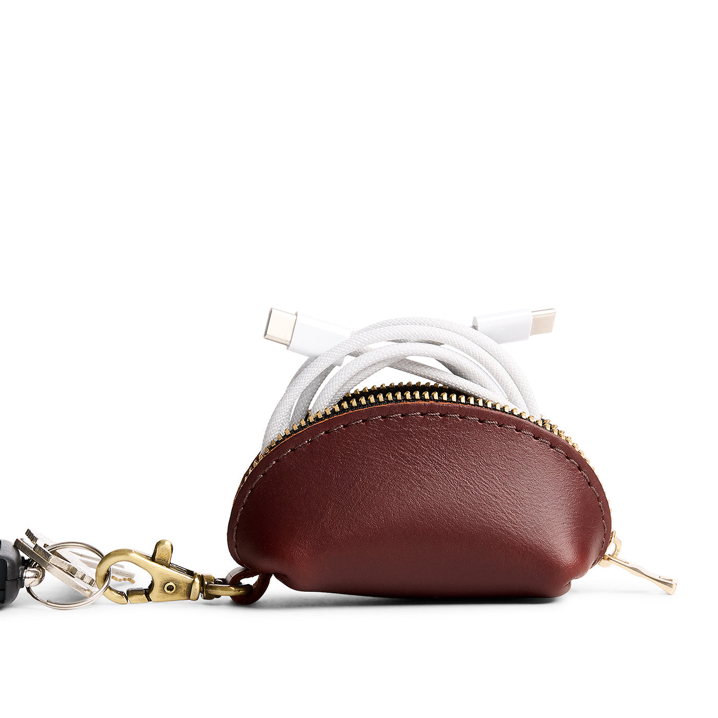 Cognac | Taco shaped leather pouch with zipper and swivel lobster clasp on white background
