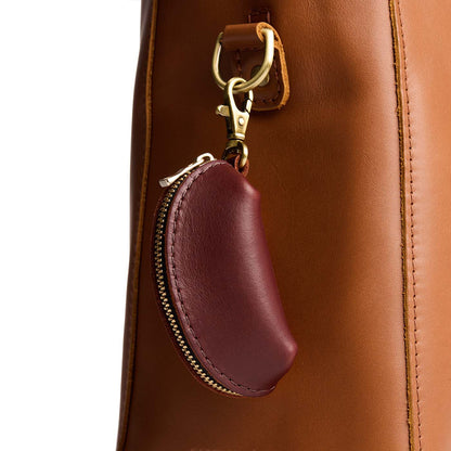 Cognac | Taco shaped leather pouch with zipper and swivel lobster clasp on bag
