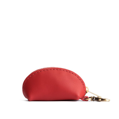 Crimson | Taco shaped leather pouch with zipper and swivel lobster clasp on white background