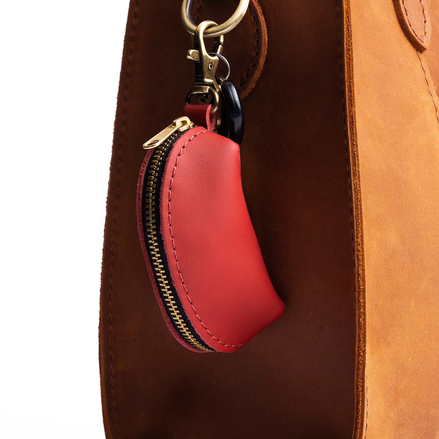 Crimson | Taco shaped leather pouch with zipper and swivel lobster clasp on bag