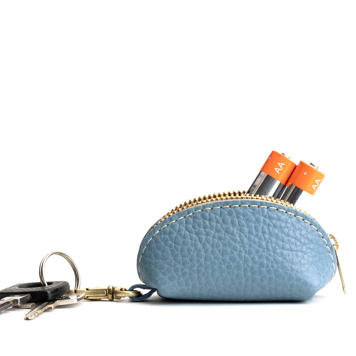 Dream | Taco shaped leather pouch with zipper and swivel lobster clasp on white background