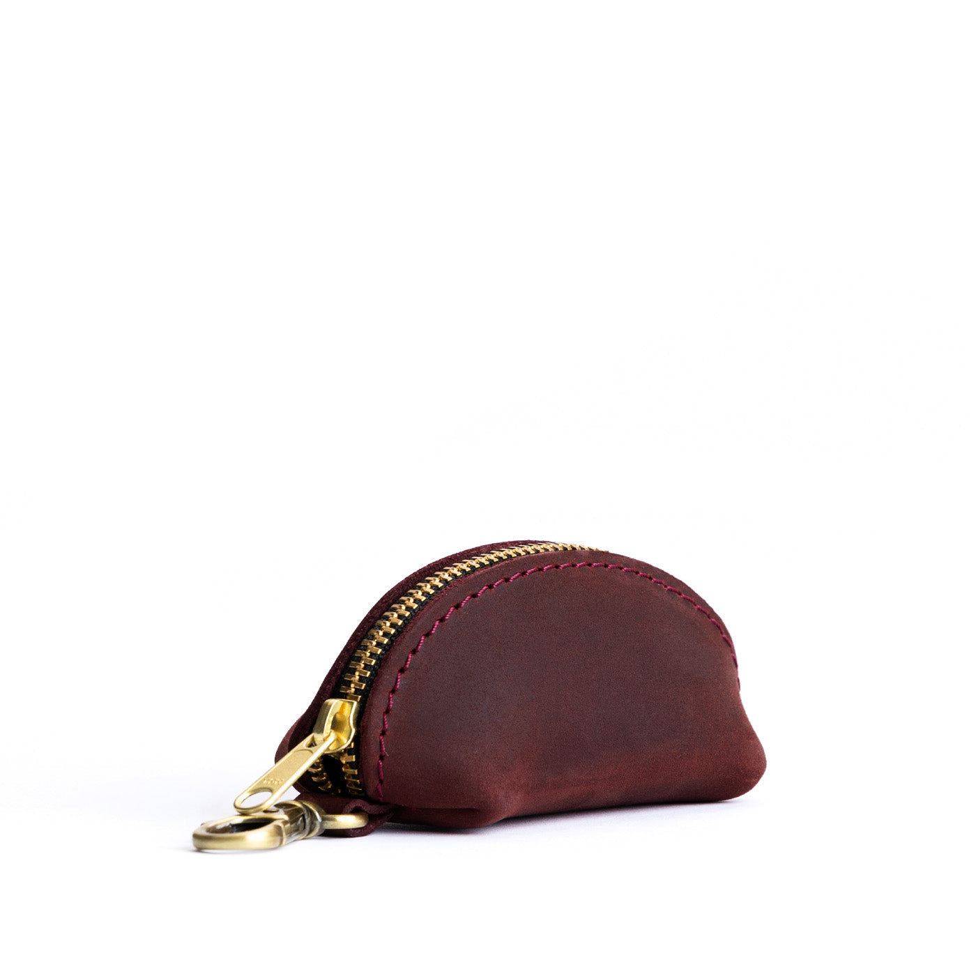Merlot | Taco shaped leather pouch with zipper and swivel lobster clasp on white background