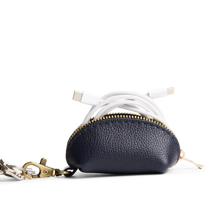 Night Owl | Taco shaped leather pouch with zipper and swivel lobster clasp on white background