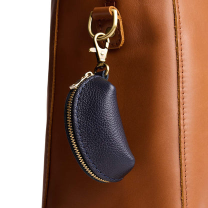 Night Owl | Taco shaped leather pouch with zipper and swivel lobster clasp on bag