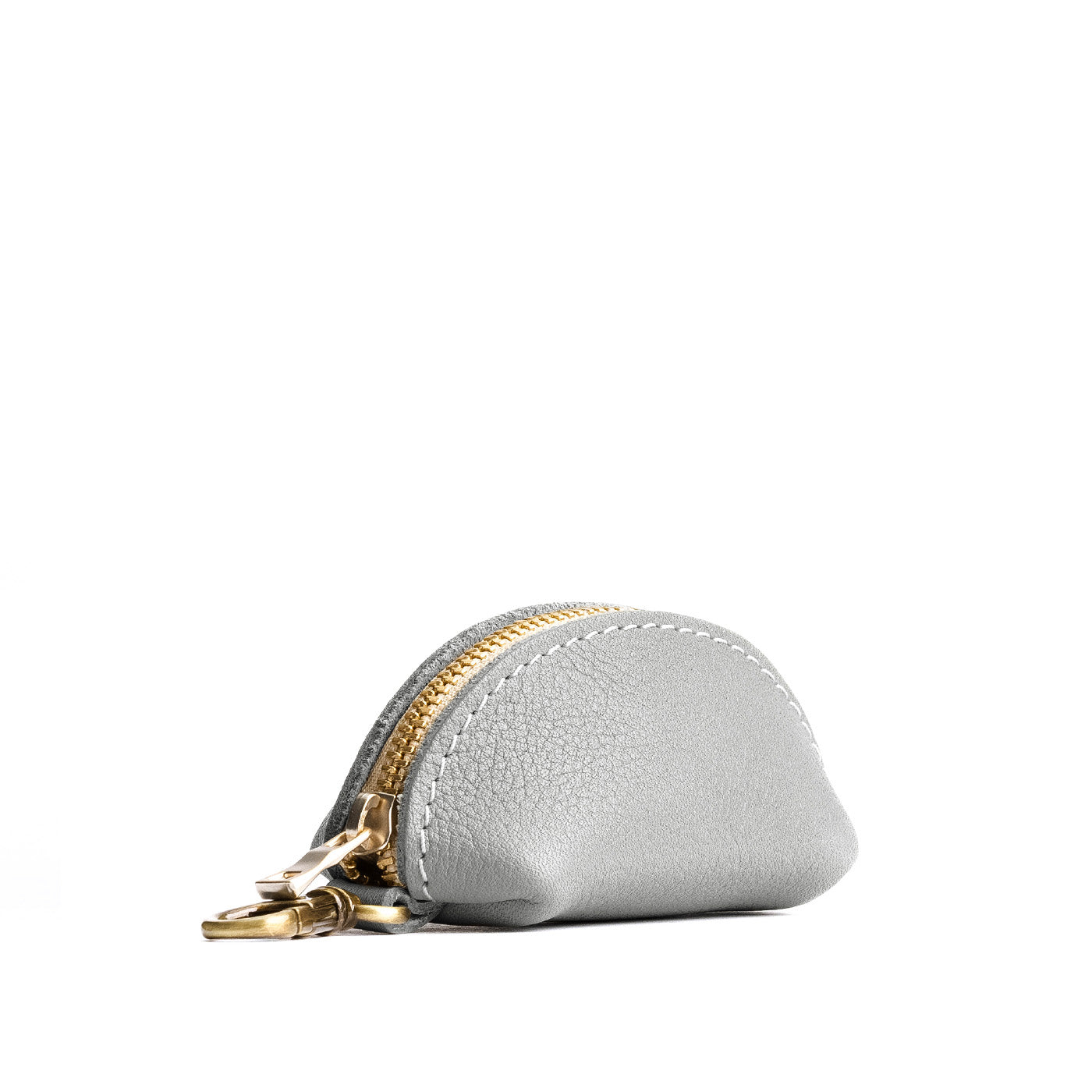 Nimbus | Taco shaped leather pouch with zipper and swivel lobster clasp on white background