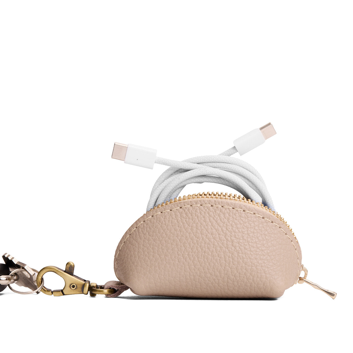 Oatmilk | Taco shaped leather pouch with zipper and swivel lobster clasp on white background