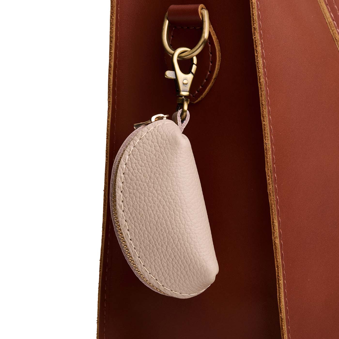 Oatmilk | Taco shaped leather pouch with zipper and swivel lobster clasp on white background