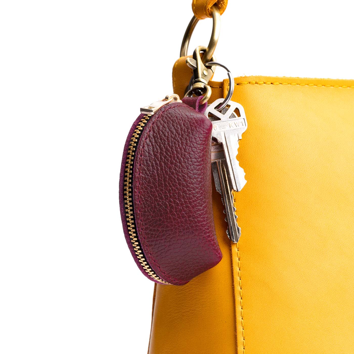 Orchid | Taco shaped leather pouch with zipper and swivel lobster clasp on bag