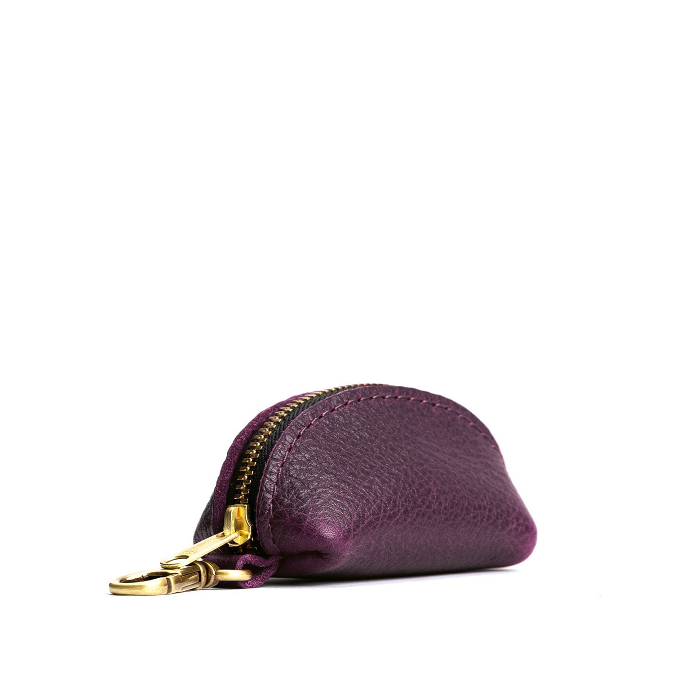 Plum | Taco shaped leather pouch with zipper and swivel lobster clasp on white background