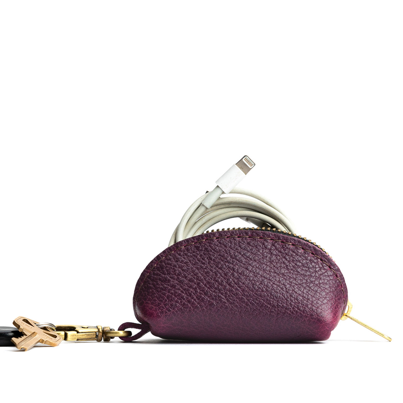 Plum | Taco shaped leather pouch with zipper and swivel lobster clasp on white background